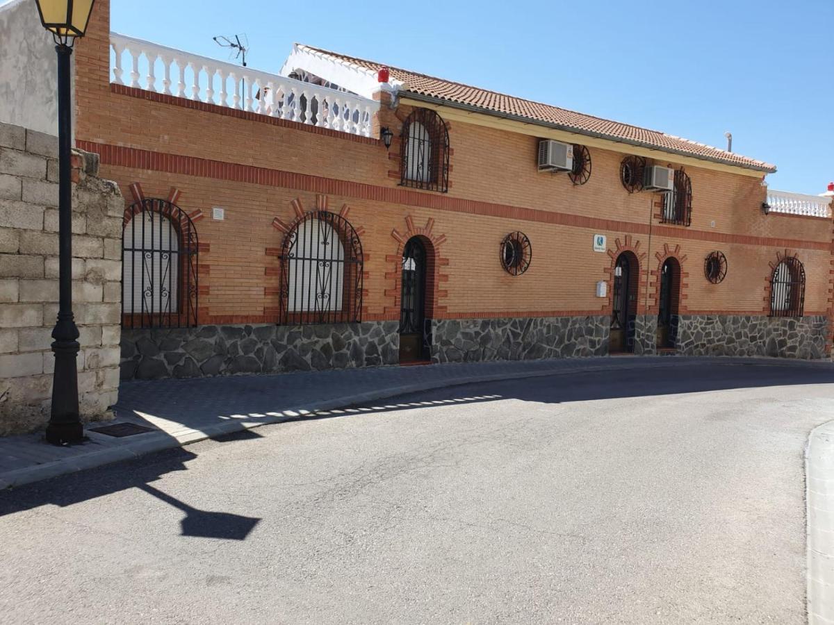 Monte Rosado Viviendas Vacacionales La Peza Exterior foto