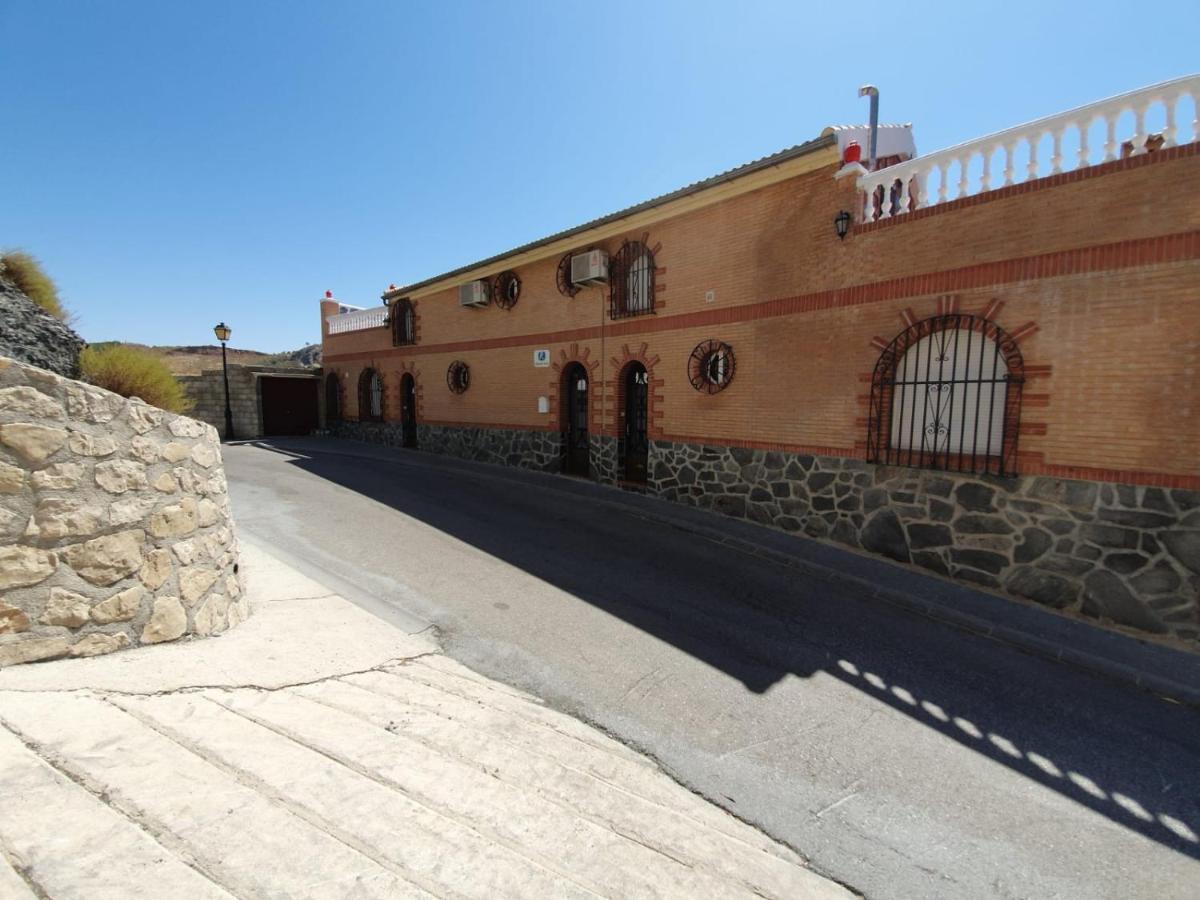 Monte Rosado Viviendas Vacacionales La Peza Exterior foto